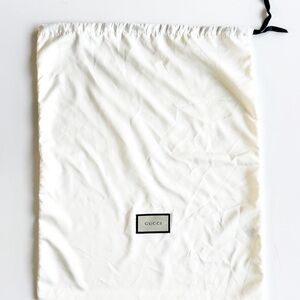 Gucci Ivory Storage Bag with Black Tie